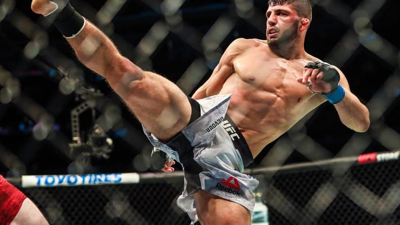 Jul 27, 2019; Edmonton, Alberta, Canada; Arman Tsarukyan (blue gloves) during his fight against Olivier Aubin-Mercier (red gloves) during UFC 240 at Rogers Place. Mandatory Credit: Sergei Belski-USA TODAY Sports