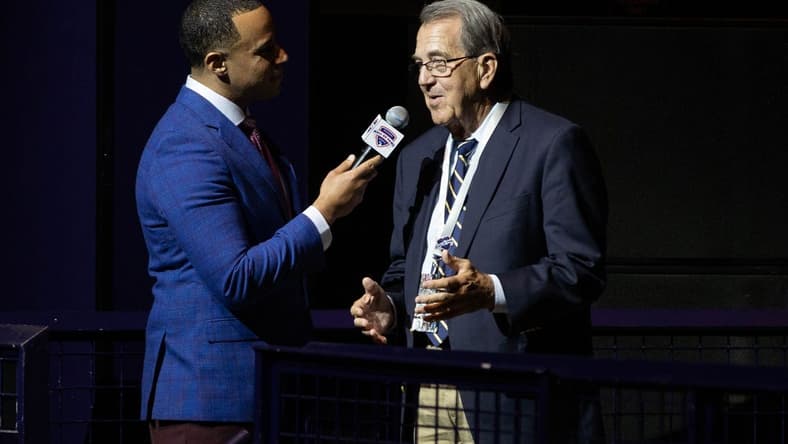Co-host Josh Landon speaks with former University of Michigan football coach Lloyd Carr during 2019 Michigan Sports Hall of Fame induction ceremony at MotorCity Casino Hotel, Saturday, Oct. 5, 2019.

100519 Halloffame Amb 003