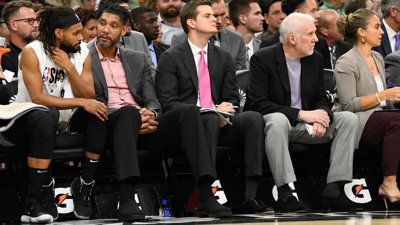 Oct 26, 2019; San Antonio, TX, USA; San Antonio Spurs (from left to right) guard Patty Mills (14), assistant coaches Tim Duncan and Will Hardy, head coach Gregg Popovich and assistant coach Becky Hammon during the third quarter against the Washington Wizards at AT&T Center. Mandatory Credit: Scott Wachter-USA TODAY Sports