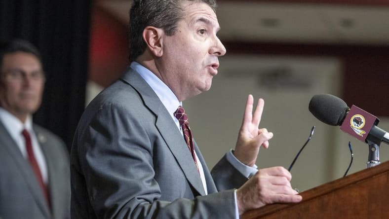Jan 2, 2020; Ashburn, VA, USA; Washington Redskins head coach Ron Rivera looks on as owner Daniel Snyder speaks during his introductory press conference at Inova Sports Performance Center. Mandatory Credit: Brad Mills-USA TODAY Sports