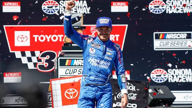 Jun 6, 2021; Sonoma, California, USA;  NASCAR Cup Series driver Kyle Larson (5) celebrates in confetti after winning the Toyota-Save Mart 350 at Sonoma Raceway. Mandatory Credit: Stan Szeto-USA TODAY Sports