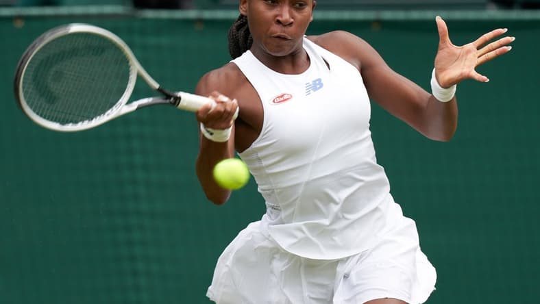Jul 5, 2021; London, United Kingdom;  Coco Gauff (USA) seen playing Angelique Kerber (GER) on the Centre court in the ladies fourth round at All England Lawn Tennis and Croquet Club. Mandatory Credit: Peter van den Berg-USA TODAY Sports