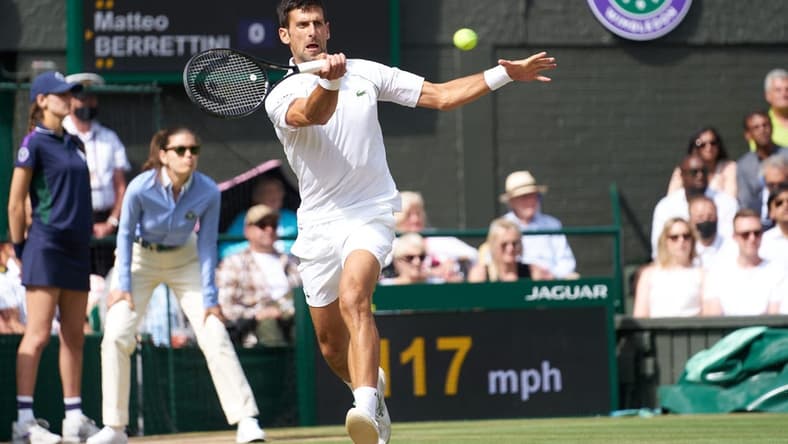 Jul 11, 2021; London, United Kingdom; Novak Djokovic (SRB) plays against Matteo Berrettini (ITA) in the men s final on Centre Court at All England Lawn Tennis and Croquet Club. Mandatory Credit: Peter van den Berg-USA TODAY Sports