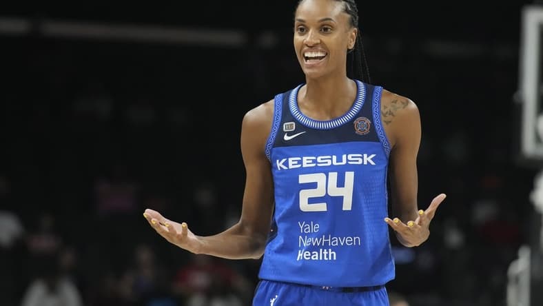 Aug 12, 2021; Phoenix, Arizona, USA; Connecticut Sun guard DeWanna Bonner (24) reacts after a foul call in the first half against the Seattle Storm during the Inaugural WNBA Commissioners Cup Championship Game at Footprint Center. Mandatory Credit: Rick Scuteri-USA TODAY Sports