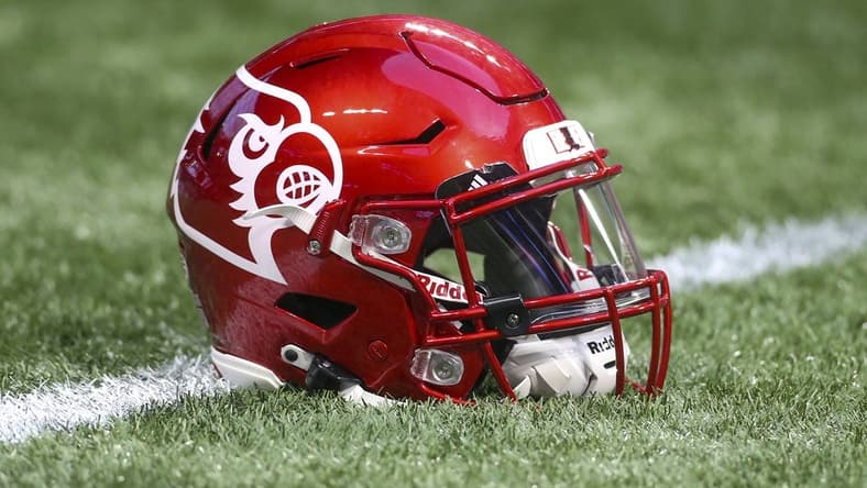 Sep 6, 2021; Atlanta, Georgia, USA; Detailed view of a Louisville Cardinals helmet on the field before a game against the Mississippi Rebels at Mercedes-Benz Stadium. Mandatory Credit: Brett Davis-USA TODAY Sports