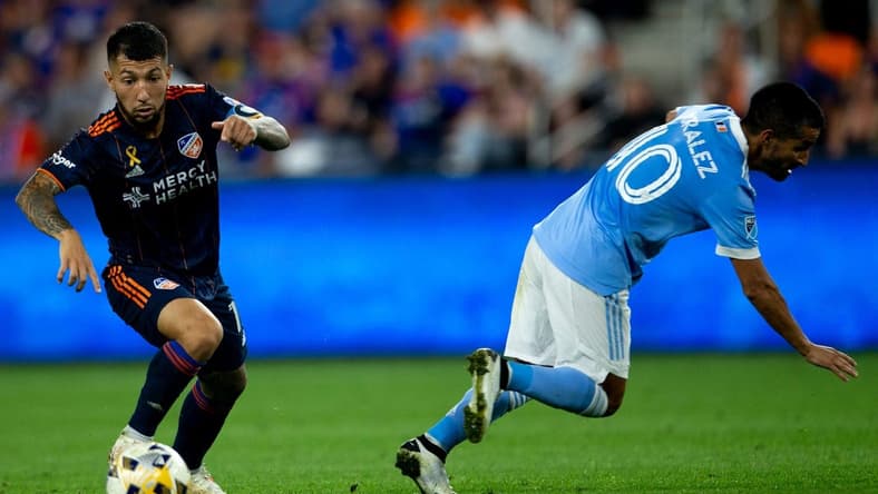 FC Cincinnati midfielder Luciano Acosta (11) jukes New York City midfielder Maximiliano Moralez (10) in the second half of the MLS match on Saturday, Sept. 18, 2021, at TQL Stadium in West End. New York City FC defeated FC Cincinnati 2-1.

Fc Cincinnati New York City