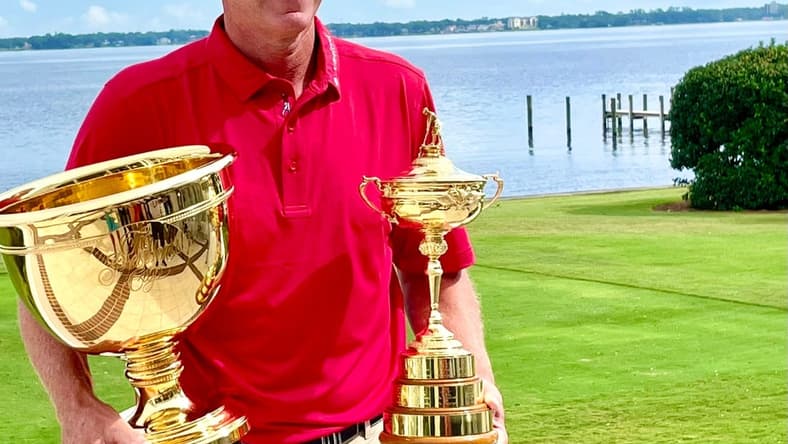 Steve Stricker displays the Presidents Cup (left) and the Ryder Cup after a news conference at the Timuquana Country Club on Thursday. Strickers is the third U.S. captain to have won both.

Stricker