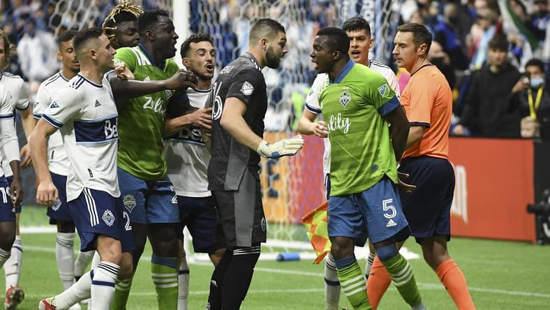 Nov 7, 2021; Vancouver, British Columbia, CAN;  The Seattle Sounders and the Vancouver Whitecaps exchange words during the second half at BC Place. Mandatory Credit: Anne-Marie Sorvin-USA TODAY Sports