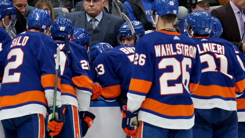 Nov 20, 2021; Elmont, New York, USA; New York Islanders head coach Barry Trotz talks to his team during a time out during the third period against the Calgary Flames at UBS Arena. Mandatory Credit: Brad Penner-USA TODAY Sports