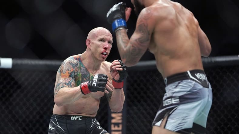 Dec 11, 2021; Las Vegas, Nevada, USA; Josh Emmett fights against Dan Ige during UFC 269 at T-Mobile Arena. Mandatory Credit: Stephen R. Sylvanie-USA TODAY Sports