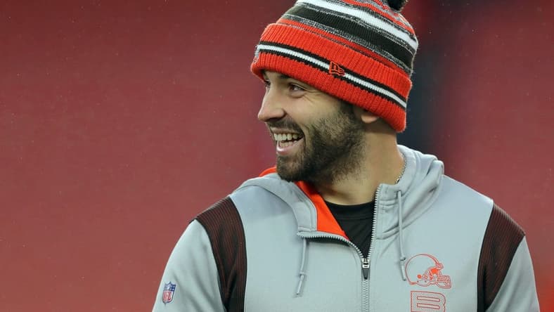 Browns quarterback Baker Mayfield laughs as he watches his teammates warm up before a game against the Cincinnati Bengals, Sunday, Jan. 9, 2022, in Cleveland.
Baker Pregame 2