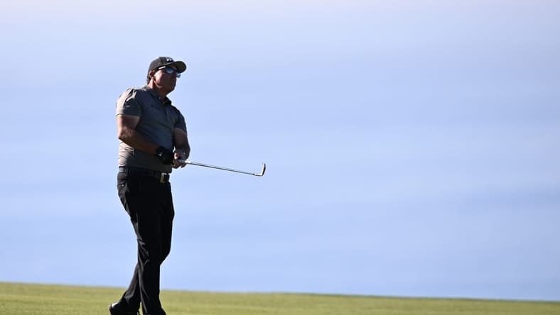 Jan 27, 2022; San Diego, California, USA; Phil Mickelson plays his second shot on the fourth hole during the first round of the Farmers Insurance Open golf tournament at Torrey Pines Municipal Golf Course - South Course. Mandatory Credit: Orlando Ramirez-USA TODAY Sports