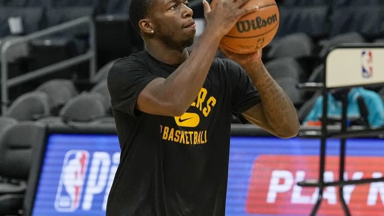 Jan 28, 2022; Charlotte, North Carolina, USA; Los Angeles Lakers guard Kendrick Nunn (12) during pregame warm ups against the Charlotte Hornets at the Spectrum Center. Mandatory Credit: Jim Dedmon-USA TODAY Sports