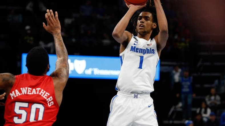 Jan 20, 2022; Memphis, Tennessee, USA; Memphis Tigers forward Emoni Bates (1) shoots for three during the first half against the Southern Methodist Mustangs at FedExForum. Mandatory Credit: Petre Thomas-USA TODAY Sports