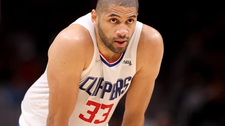 Mar 11, 2022; Atlanta, Georgia, USA; LA Clippers forward Nicolas Batum (33) reacts to a play during their game against the Atlanta Hawks at State Farm Arena. Mandatory Credit: Jason Getz-USA TODAY Sports