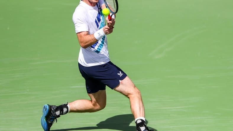 Andy Murray of Great Britain returns to Alexander Bublik of Kazakhstan during round two of the BNP Paribas Open at the Indian Wells Tennis Garden in Indian Wells, Calif., Sunday, March 13, 2022.