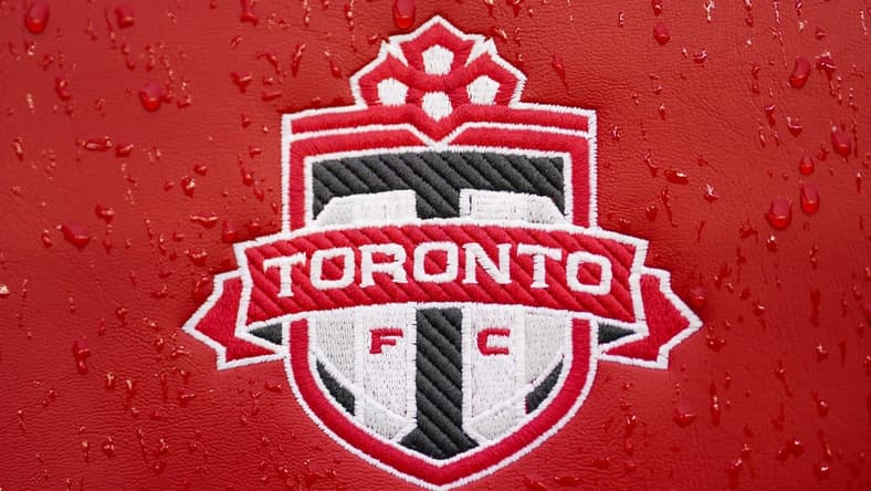 Mar 19, 2022; Toronto, Ontario, CAN;  Toronto FC logo on seat is covered in rain before an MLS game between D.C. United and Toronto FC at BMO Field. Mandatory Credit: Kevin Sousa-USA TODAY Sports
