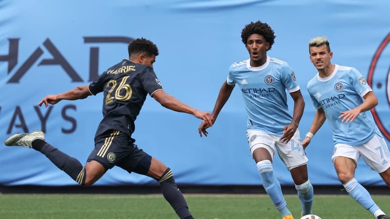 Mar 19, 2022; New York, New York, USA; Philadelphia Union defender Nathan Harriel (26) plays the ball against New York City forward Talles Magno (43) and midfielder Alfredo Morales (7) during the second half at Yankee Stadium. Mandatory Credit: Vincent Carchietta-USA TODAY Sports