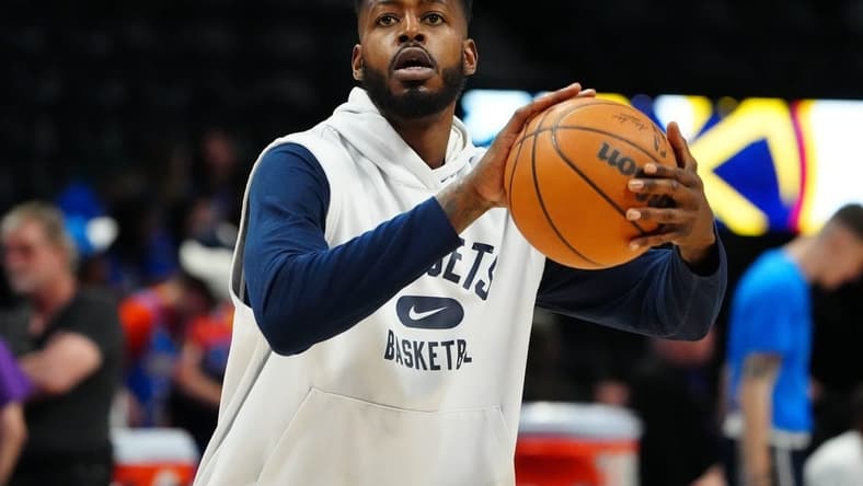 Mar 26, 2022; Denver, Colorado, USA; Denver Nuggets forward JaMychal Green (0) before the game against the Oklahoma City Thunder at Ball Arena. Mandatory Credit: Ron Chenoy-USA TODAY Sports