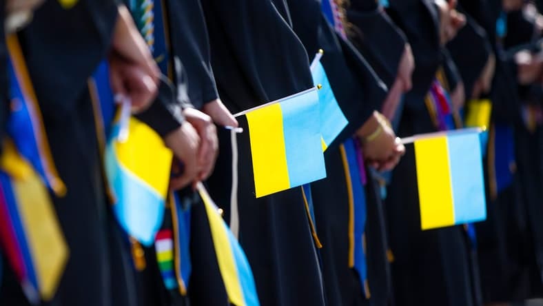 Graduates hold Ukrainian flags during the Notre Dame Commencement ceremony Sunday, May 15, 2022 at Notre Dame Stadium in South Bend.
Notre Dame Commencement