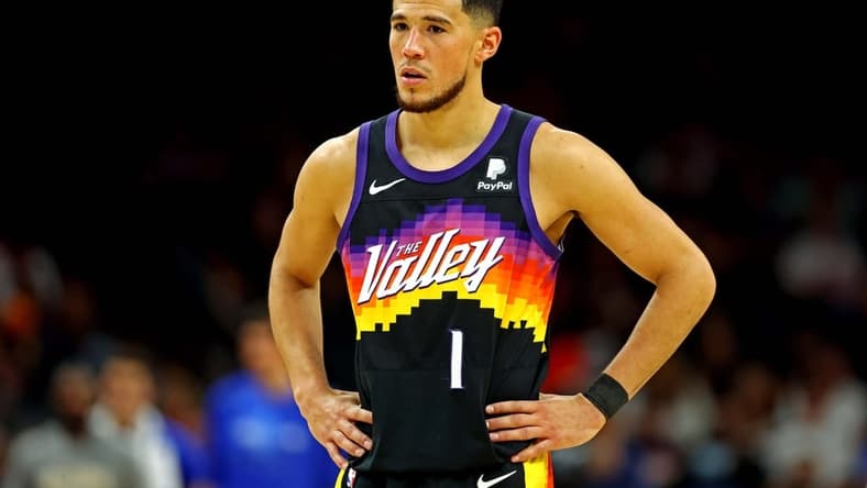 May 15, 2022; Phoenix, Arizona, USA; Phoenix Suns guard Devin Booker (1) reacts during the fourth quarter against the Dallas Mavericks in game seven of the second round for the 2022 NBA playoffs at Footprint Center. Mandatory Credit: Mark J. Rebilas-USA TODAY Sports