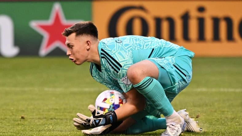 May 14, 2022; Chicago, Illinois, USA;  Chicago Fire FC goalkeeper Gaga Slonina (1) defends the net against FC Cincinnati at Soldier Field. Mandatory Credit: Jamie Sabau-USA TODAY Sports