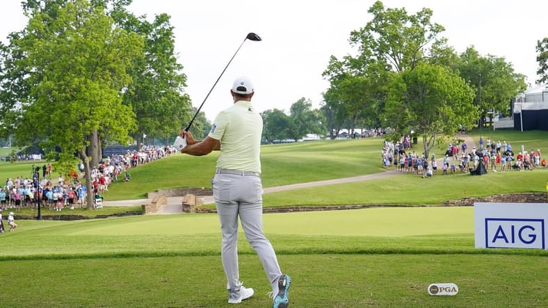 May 20, 2022; Tulsa, OK, USA; Dustin Johnson plays his shot from the 13th tee during the second round of the PGA Championship golf tournament at Southern Hills Country Club. Mandatory Credit: Michael Madrid-USA TODAY Sports