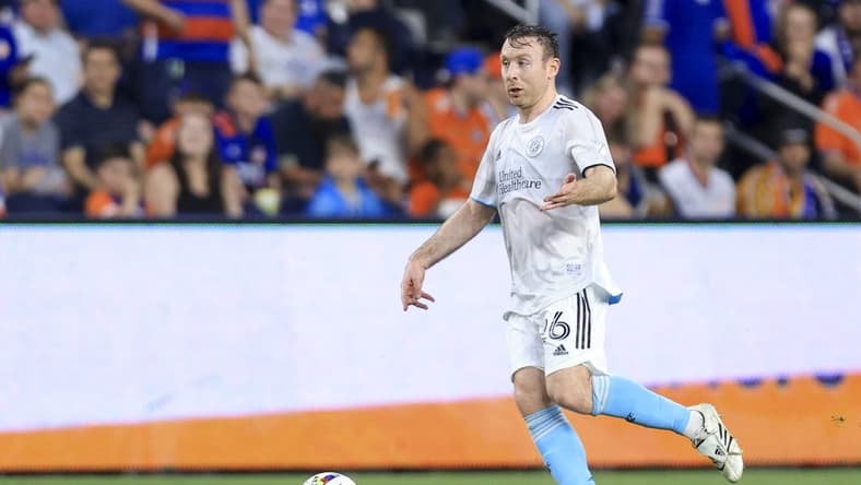 May 21, 2022; Cincinnati, Ohio, USA;  New England Revolution midfielder Thomas McNamara (26) controls the ball against FC Cincinnati in the second half at TQL Stadium. Mandatory Credit: Aaron Doster-USA TODAY Sports