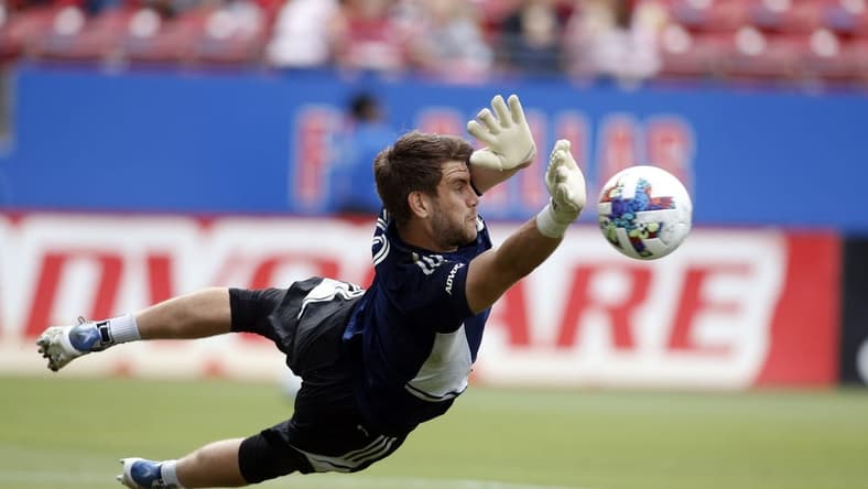 May 22, 2022; Frisco, Texas, USA; FC Dallas goalkeeper Maarten Paes (30) makes a save during warmups before the match against the Minnesota United at Toyota Stadium. Mandatory Credit: Tim Heitman-USA TODAY Sports