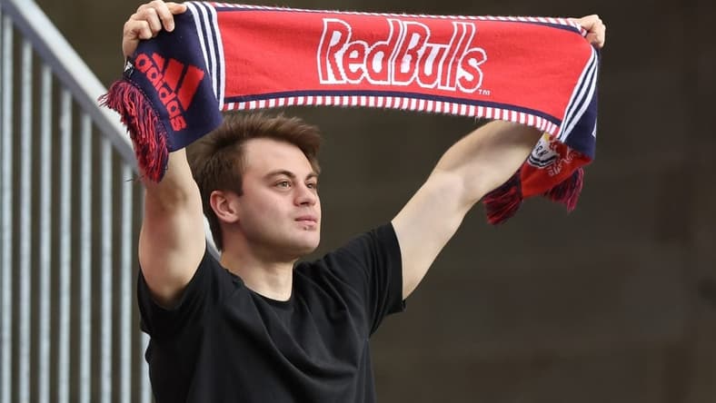 May 18, 2022; Harrison, New Jersey, USA; A fan holds a Red Bulls scarf before the game between the New York Red Bulls and the Chicago Fire at Red Bull Arena. Mandatory Credit: Vincent Carchietta-USA TODAY Sports