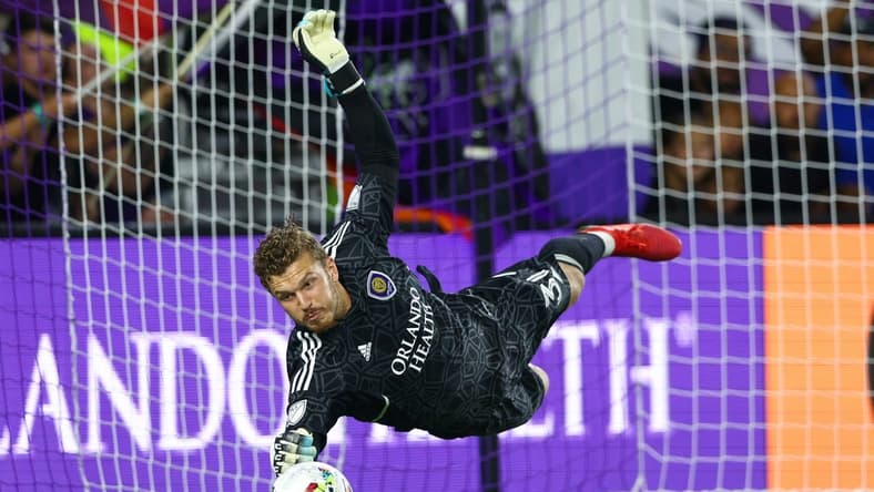 May 25, 2022; Orlando, Florida, USA; Orlando City goalkeeper Mason Stajduhar (31) saves a penalty kick after the end of overtime against Inter Miami at Exploria Stadium. Mandatory Credit: Nathan Ray Seebeck-USA TODAY Sports