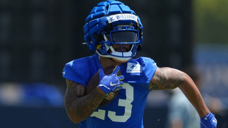 Jun 3, 2022; Thousand Oaks, CA, USA; Los Angeles Rams running back Kyren Williams (23) carries the ball during organized team activities at California Lutheran University. Mandatory Credit: Kirby Lee-USA TODAY Sports