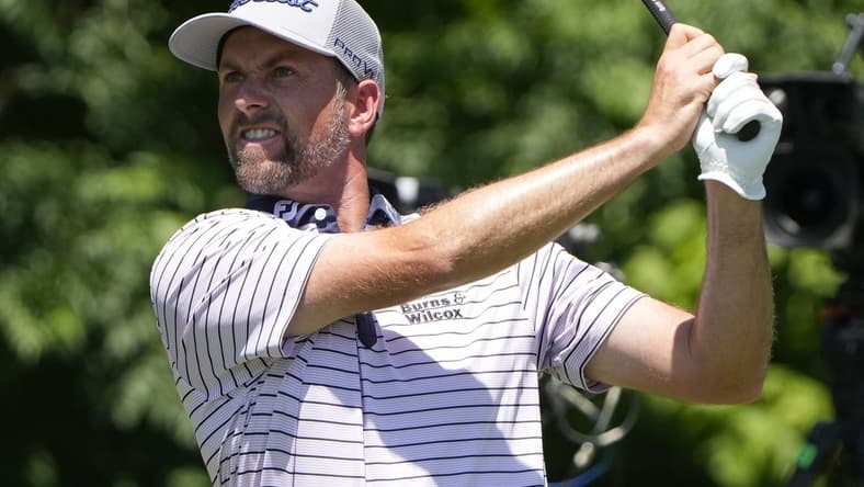 May 27, 2022; Fort Worth, Texas, USA; Webb Simpson plays his shot from the eighth tee during the second round of the Charles Schwab Challenge golf tournament. Mandatory Credit: Jim Cowsert-USA TODAY Sports