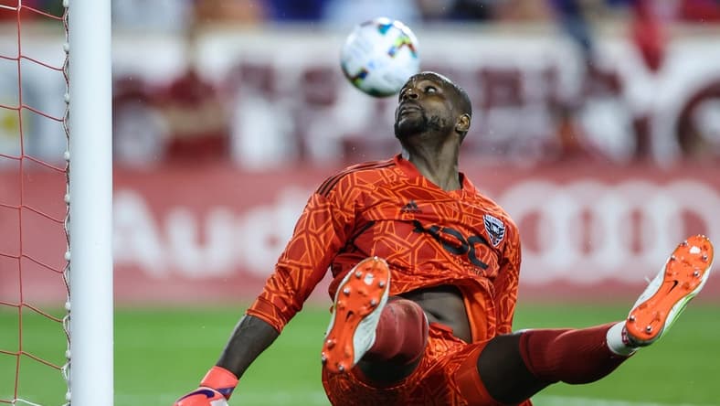 May 28, 2022; Harrison, New Jersey, USA; D.C. United goalkeeper Bill Hamid (28) looks back at a shot on goal during the second half against the New York Red Bulls at Red Bull Arena. Mandatory Credit: Vincent Carchietta-USA TODAY Sports