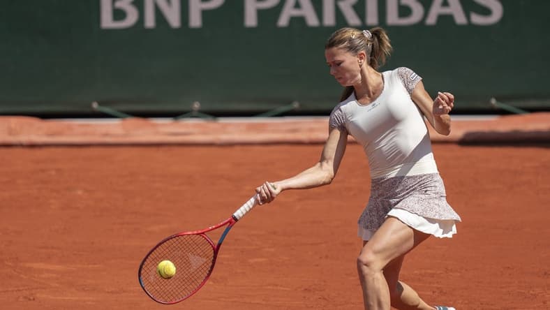 May 30, 2022; Paris, France; Camila Giorgi (ITA) returns a shot during her match against Daria Kasatkina on day nine of the French Open at Stade Roland-Garros. Mandatory Credit: Susan Mullane-USA TODAY Sports