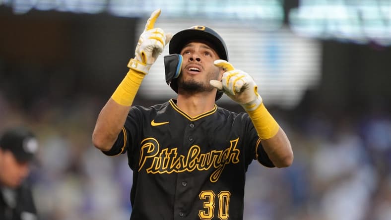 May 31, 2022; Los Angeles, California, USA; Pittsburgh Pirates left fielder Tucupita Marcano (30) celebrates after hitting a two-run home run in the second inning against the Los Angeles Dodgers at Dodger Stadium. Mandatory Credit: Kirby Lee-USA TODAY Sports