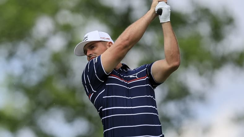 Jun 2, 2022; Dublin, Ohio, USA; Bryson DeChambeau plays his shot from the ninth tee during the first round of the Memorial Tournament. Mandatory Credit: Aaron Doster-USA TODAY Sports