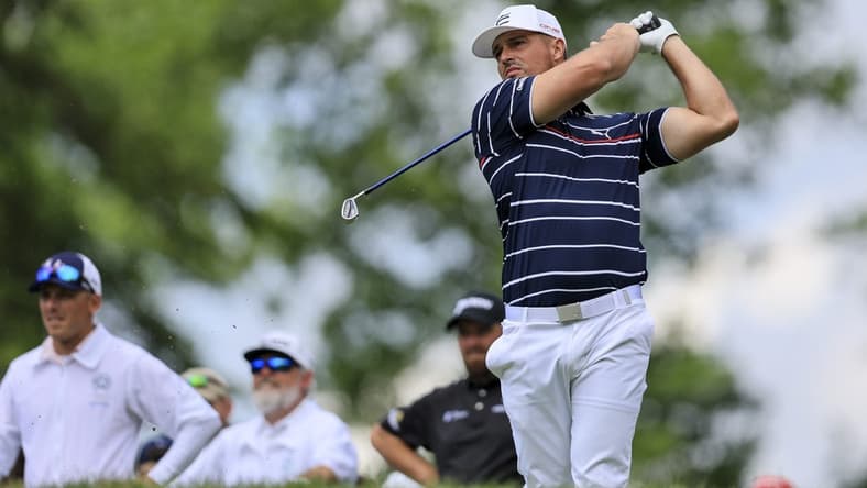 Jun 2, 2022; Dublin, Ohio, USA; Bryson DeChambeau plays his shot from the ninth tee during the first round of the Memorial Tournament. Mandatory Credit: Aaron Doster-USA TODAY Sports