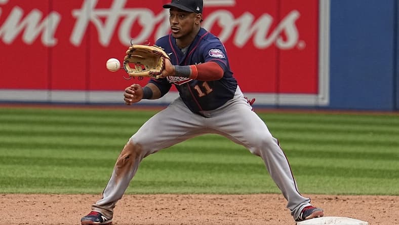 Jun 5, 2022; Toronto, Ontario, CAN; Minnesota Twins second baseman Jorge Polanco (11) makes a catch at second base to put out Toronto Blue Jays pinch runner Bradley Zimmer (not pictured) during the ninth inning at Rogers Centre. Mandatory Credit: John E. Sokolowski-USA TODAY Sports