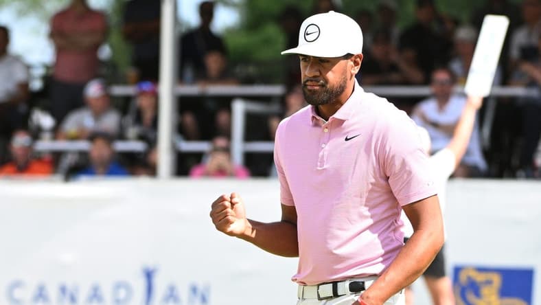 Jun 11, 2022; Etobicoke, Ontario, CAN; Tony Finau hits a reacts on the 18th green during the third round of the RBC Canadian Open golf tournament. Mandatory Credit: Dan Hamilton-USA TODAY Sports
