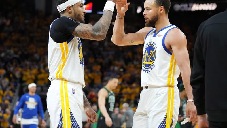 Jun 13, 2022; San Francisco, California, USA; Golden State Warriors guard Stephen Curry (30) celebrates with  guard Gary Payton II (left) after defeating the Boston Celtics in game five of the 2022 NBA Finals at Chase Center. Mandatory Credit: Kyle Terada-USA TODAY Sports
