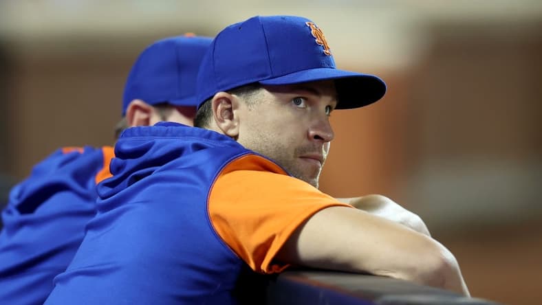 Jun 14, 2022; New York City, New York, USA; New York Mets injured pitcher Jacob deGrom looks out of the dugout during the eighth inning against the Milwaukee Brewers at Citi Field. Mandatory Credit: Brad Penner-USA TODAY Sports