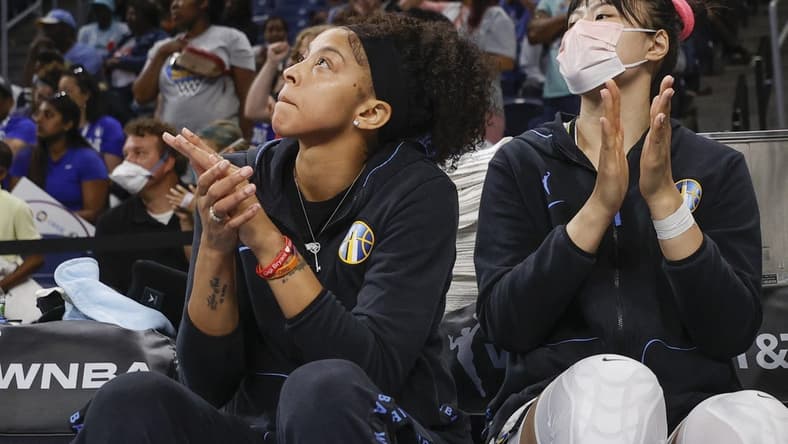 Jun 17, 2022; Chicago, Illinois, USA; Chicago Sky center Li Yueru (right) and forward Candace Parker (left) applaud their team during overtime of a WNBA game against the Atlanta Dream at Wintrust Arena. Mandatory Credit: Kamil Krzaczynski-USA TODAY Sports