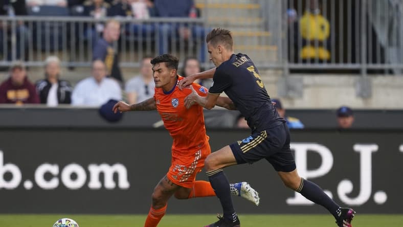 Jun 18, 2022; Chester, Pennsylvania, USA; FC Cincinnati forward Brandon Vazquez (19) controls the ball against Philadelphia Union defender Jack Elliott (3) in the first half at Subaru Park. Mandatory Credit: Mitchell Leff-USA TODAY Sports