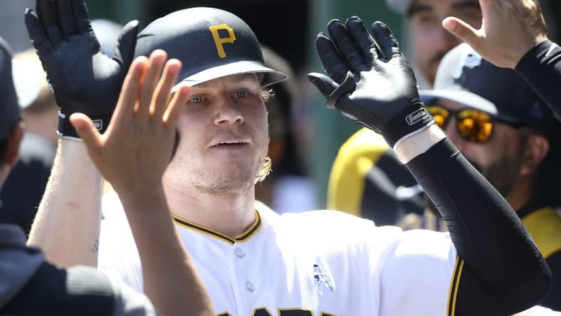 Jun 19, 2022; Pittsburgh, Pennsylvania, USA; Pittsburgh Pirates left fielder Jack Suwinski (65) celebrates his second solo home run of the game in the dugout against the San Francisco Giants during the sixth inning at PNC Park. Mandatory Credit: Charles LeClaire-USA TODAY Sports