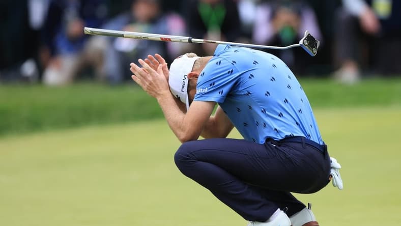 Jun 19, 2022; Brookline, Massachusetts, USA; Will Zalatoris reacts after missing a putt on the 18th green during the final round of the U.S. Open golf tournament. Mandatory Credit: Aaron Doster-USA TODAY Sports