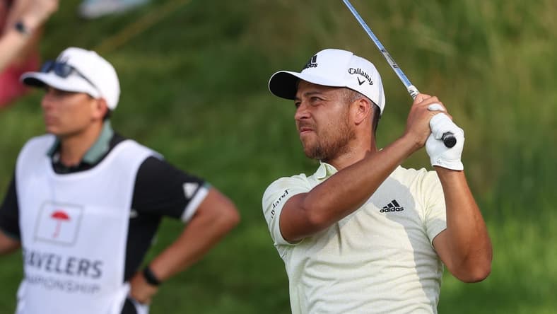 Jun 24, 2022; Cromwell, Connecticut, USA; Xander Schauffele plays a shot from the 17th tee during the second round of the Travelers Championship golf tournament. Mandatory Credit: Vincent Carchietta-USA TODAY Sports