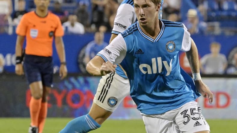 Jun 25, 2022; Montreal, Quebec, CAN; Charlotte FC  midfielder Quinn McNeill (35) plays the ball during the second half against CF Montreal at Stade Saputo. Mandatory Credit: Eric Bolte-USA TODAY Sports