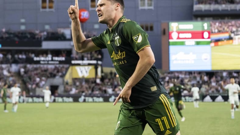 Jun 25, 2022; Portland, Oregon, USA;  Portland Timbers forward Jaroslaw Niezgoda (11) celebrates during the second half after scoring a goal against the Colorado Rapids at Providence Park. The Portland Timbers won 3-0. Mandatory Credit: Troy Wayrynen-USA TODAY Sports