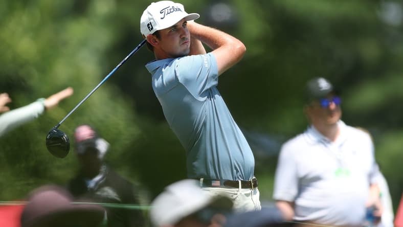 Jun 26, 2022; Cromwell, Connecticut, USA; J.T. Poston plays a shot from the first tee during the final round of the Travelers Championship golf tournament. Mandatory Credit: Vincent Carchietta-USA TODAY Sports